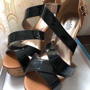 Tan & black wedges with straps. Never worn. Size 7